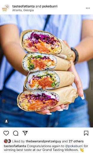 Hands holding sushi burritos on an Instagram recap post